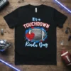 Black t-shirt with "It's a Touchdown Kinda Day" text, football graphic, and red heart