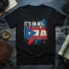 Puerto Rico flag integrated into "DNA" text with island map background, "IT'S IN MY DNA" quote on black t-shirt