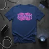 IT'S THE AUDACITY FOR ME text in bold pink neon font with floral accents on a navy t-shirt