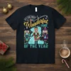 It's the Most Wonderful Time of the Year text with Nutcracker figures graphic on a dark t-shirt