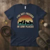 Dachshund silhouettes against a retro sunset with text "I've Got Friends In Low Places" on a navy t-shirt