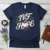 IVF Got Hope t-shirt design with white script text, pink glowing heart, and gold starbursts