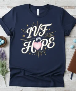IVF Got Hope t-shirt design with white script text, pink glowing heart, and gold starbursts