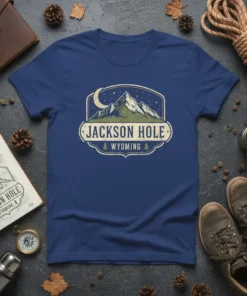 Jackson Hole Wyoming t-shirt with a vintage badge design featuring mountains, moon, and stars
