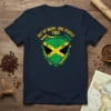 Navy t-shirt featuring the Jamaican national motto "OUT of MANY, ONE PEOPLE 1962" above a distressed Jamaican flag shield design