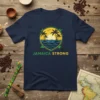 Jamaica Strong t-shirt design with tropical sunset, palm trees, ocean waves, and crossed oars graphic