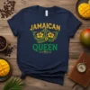 Navy t-shirt with "Jamaican Queen" text and a decorative crown with yellow hibiscus flowers