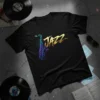 Black t-shirt with "JAZZ" in golden brushstrokes and a colorful saxophone graphic, representing Jazz Saxophone Music