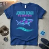 Jensen Beach Florida neon text with a geometric shark graphic on a navy blue t-shirt