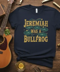 Jeremiah Was A Bullfrog quote on a navy t-shirt with lily pad graphics, vintage style