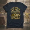 T-shirt with the quote "If You Bring Up My Past You Should Know That Jesus Dropped The Charges" in gold