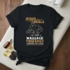 Black t-shirt with "Jesus Heals I'm Just a Massage Therapist Lending My Hand" text and a graphic of a person