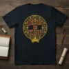 Jesus Is King text design with ornate gold border and crown graphic on a navy t-shirt
