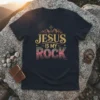 Jesus Is My Rock t-shirt design with golden text, mountains, and a cross graphic