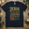 Jesus is the Reason for the Season t-shirt with gold glitter text, Christmas tree, and poinsettia graphic