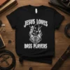 Black t-shirt with white text "Jesus Loves Bass Players" and a graphic of a bass guitar neck with flames and