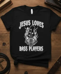 Black t-shirt with white text "Jesus Loves Bass Players" and a graphic of a bass guitar neck with flames and