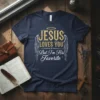 Jesus Loves You But I'm His Favorite t-shirt with gold and silver glitter text and angelic wings graphic