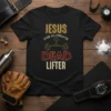 Jesus The Ultimate Dead Lifter T-Shirt with barbell graphic and cross symbol. Christian fitness apparel