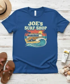 Joe's Surf Shop text with a vintage camper van, palm trees, a sunset, and ocean waves graphic on a blue