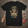 Black t-shirt with "Jose Can You See? Chelas Y Cuetes" design featuring a skeleton wearing a sombrero, holding a beer