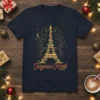 Joyeux Noël t-shirt design with a gold Eiffel Tower decorated with colorful Christmas lights and festive swirls