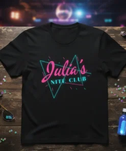 Black t-shirt with "Julia's NITE CLUB" in retro neon pink and teal font, evoking an 80s vibe