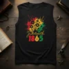 Juneteenth 1865 design with red, yellow, and green paint splatters and floral elements on a black t-shirt