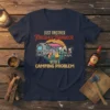 T-shirt with text "Just Another Fireball Drinker With A Camping Problem" and cartoon illustration of a camper, campfire, and person
