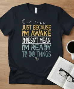 Just Because I'm Awake Doesn't Mean I'm Ready To Do Thngs quote t-shirt with moon and coffee bean graphics