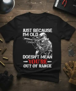 Just Because I'm Old Doesn't Mean You're Out of Range quote on black t-shirt with soldier graphic