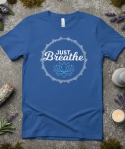 Just Breathe t-shirt with lotus flower design, white mandala circle, on royal blue fabric