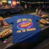 Blue t-shirt with "JUST HERE FOR THE WIENERS" text and a graphic of a hot dog in neon rings