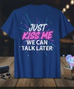 Just Kiss Me We Can Talk Later text design on a blue t-shirt with neon-style graphic accents