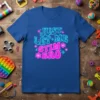 Royal blue t-shirt with neon blue and pink text reading "JUST LET ME STIM BRO" in a retro font, surrounded