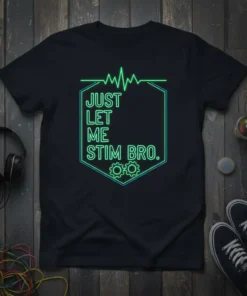 Black t-shirt with neon green and blue text "JUST LET ME STIM BRO." inside a hexagon, featuring a heartbeat line