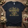 Just Married 40 Years Ago text with wedding rings and diamond on navy t-shirt design