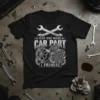 T-shirt with "Just One More Car Part I Promise" text, featuring car engine, wheel, and wrenches graphic