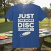 JUST ONE MORE DISC I PROMISE text with a disc graphic on a blue t-shirt, disc golf theme