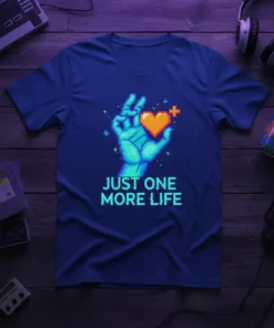 Pixel art design with text "JUST ONE MORE LIFE" and a hand holding a heart, on a navy blue t-shirt