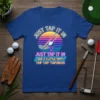 Just Tap It In Golf T-Shirt with retro sunset graphic and golf club, ball, and tee. Funny golf quote design