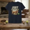 T-shirt design featuring the text "JUST THROW IT" above a running Labrador Retriever chasing a tennis ball