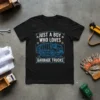 Black t-shirt with blue blueprint design of a garbage truck and text "Just A Boy Who Loves Garbage Trucks" for