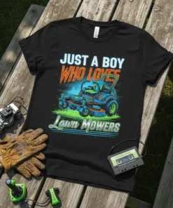 Black t-shirt design featuring bold text "JUST A BOY WHO LOVES" above a detailed illustration of a zero-turn lawn mower