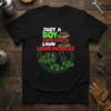 Black t-shirt with white and red text "JUST A BOY WHO LOVES LAWN MOWERS" and green illustrations of lawn mowers