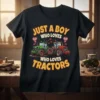Black t-shirt featuring the text "JUST A BOY WHO LOVES WHO LOVES TRACTORS" with cartoon green and red tractors and