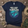 Just A Boy Who Loves Turtles t-shirt with a colorful sea turtle graphic and ocean-themed border