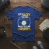 Just A Boy Who Loves To Play Drums T-Shirt design featuring a drum set graphic and gold glitter text for