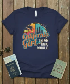Just a California Girl in an Ohio World text design with retro sunset, palm trees, and city skyline graphic