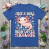 Just A Girl Who Loves Axolotls text with a cute pink axolotl illustration on a blue t-shirt